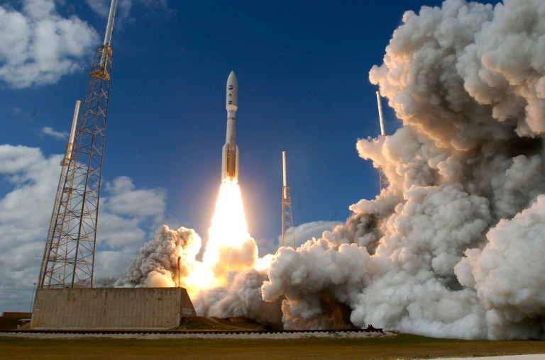 A Lockheed Martin Atlas V rocket carrying the New Horizons spacecraft lifts off from Launch Complex 41 at Cape Canaveral in Florida, Thursday, January 19, 2006. The New Horizons spacecraft is bound for the planet Pluto to map surface composition and temperatures, and examine Pluto's atmosphere. It will take 9 years for the spacecraft to reach the planet Pluto. (Photo by Red Huber/Orlando Sentinel/MCT via Getty Images)
